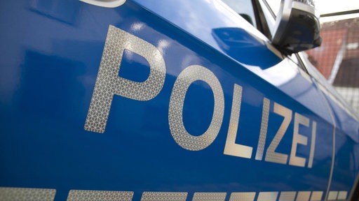 Auto der Polizei von der Seite