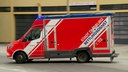 Ein Rettungswagen von Falck auf dem Weg zu einem Einsatz an der Feuerwache 3 in Duisburg