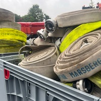 Feuerwehrschläuche in Transportboxen