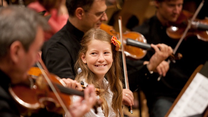 Kind im Orchester