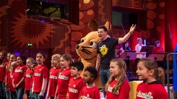 Die Maus, André Gatzke und ein Schulchor auf der Bühne im Funkhaus