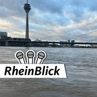 Hochwasser am Rhein in Düsseldorf mit Blick auf den Rheinturm, die Rheinknie-Brücke und den Landtag