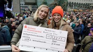 Das WDR 2 Weihnachtswunder am Sonntag (14.12.2025) - Halterner Running Crew mit Spendenscheck