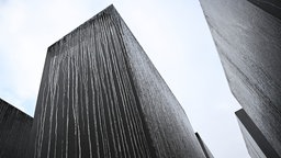 Iced-covered concrete steles stand at the Memorial to the Murdered Jews of Europe on the International Holocaust Remembrance Day, in Berlin, Germany, January 27, 2026.