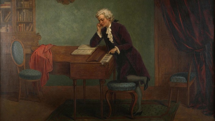 Der Komponist Wolfgang Amadeus Mozart beim Komponieren