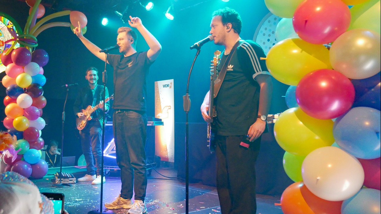 Die Band Zesamm' auf der Bühne