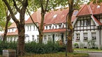 Zechenhäuser: Aussenfassaden der Wohnhäuser der Gartenstadt Welheim in Bottrop