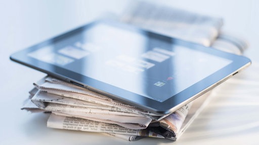 Tablet PC und Zeitungen