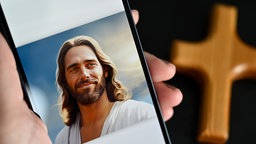 Die App "Text with Jesus" von der Tech-Firma "Catloaf Software" auf einem Smartphone 