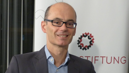 Prof.  Landry Charrier, Professor für deutsch-französischen Beziehungen und Redaktionsleiter der französisch-deutschen Zeitschrift “dokdoc“.