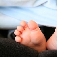 Symbolbild: Babyfüße.