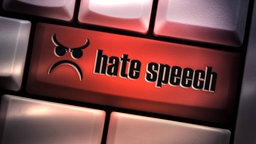 Tastatur mit Tast "hate speech"