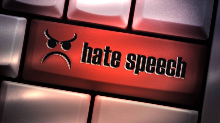 Tastatur mit Tast "hate speech"