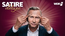 Putin zieht sich die Siegmund-Maske ab.