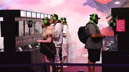Spieler an Konsolen auf der Gamescom