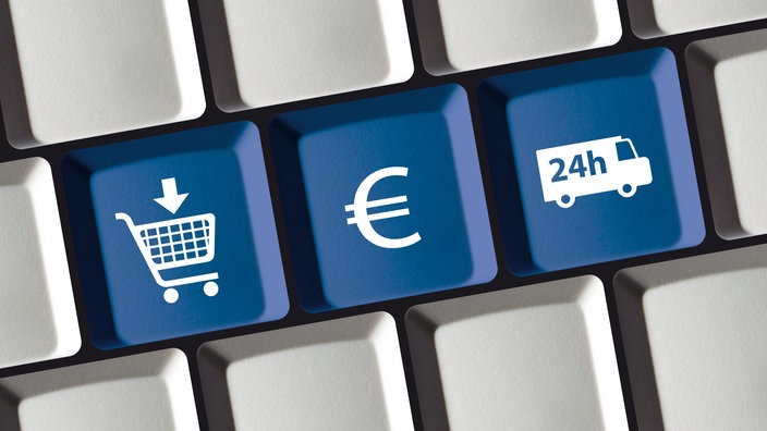 Auf einer grauen Tastatur sind zentral drei blaue Tasten zu sehen – mit den Symbolen Einkaufswagen, Euro-Zeichen und Lieferwagen.