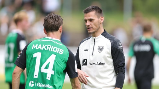 Thomas Wörle und Babis Makridis im Gespräch