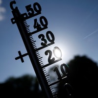 Symbolbild Hitze mit Thermometer