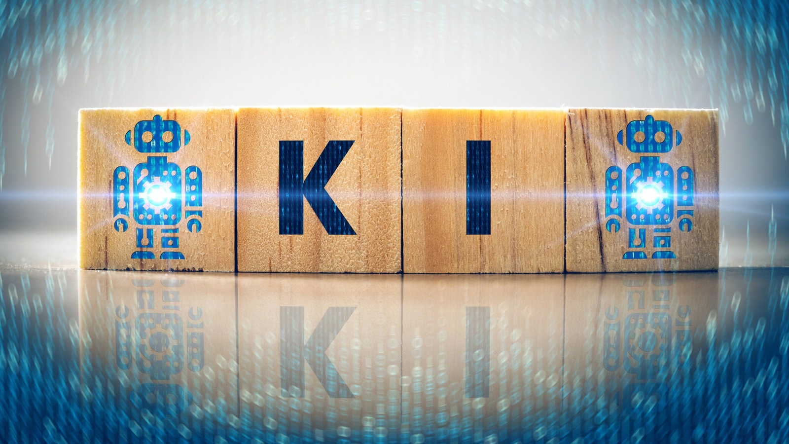 Symbolbild Künstliche Intelligenz: Holzwürfel mit Roboter-Symbolen und Schriftzug "KI".