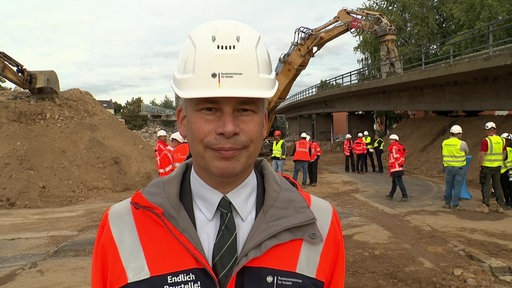 Bundesverkehrsminister Steffen Bilger an der Bonner Nordbrücke