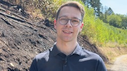 Niklas Göckeler lächelt in die Kamera 