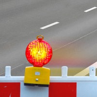 Bildmontage Sperrung einer Straße